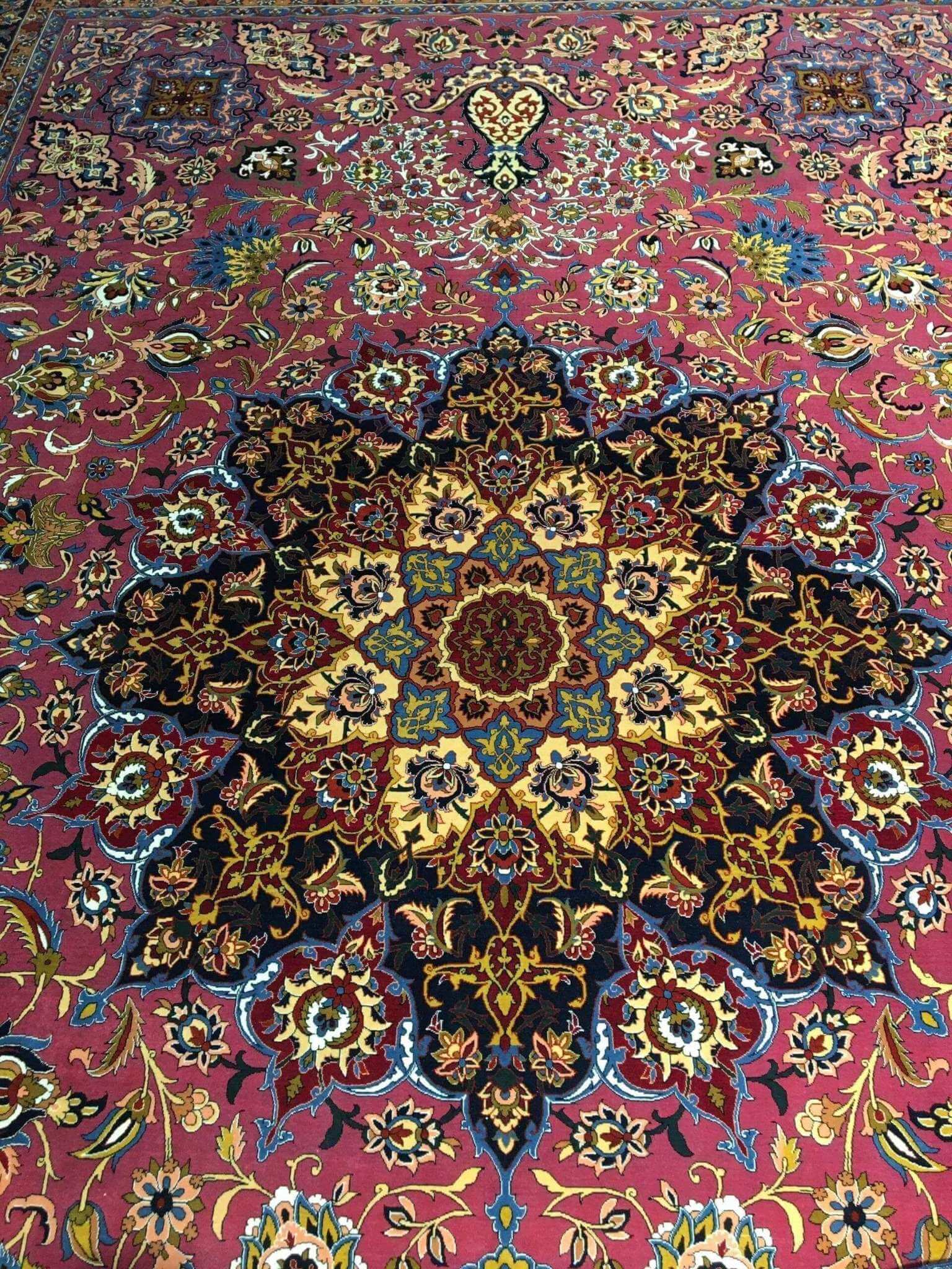 Elegant purple oriental rug featuring traditional Persian design, crafted with wool and silk for a luxurious texture.